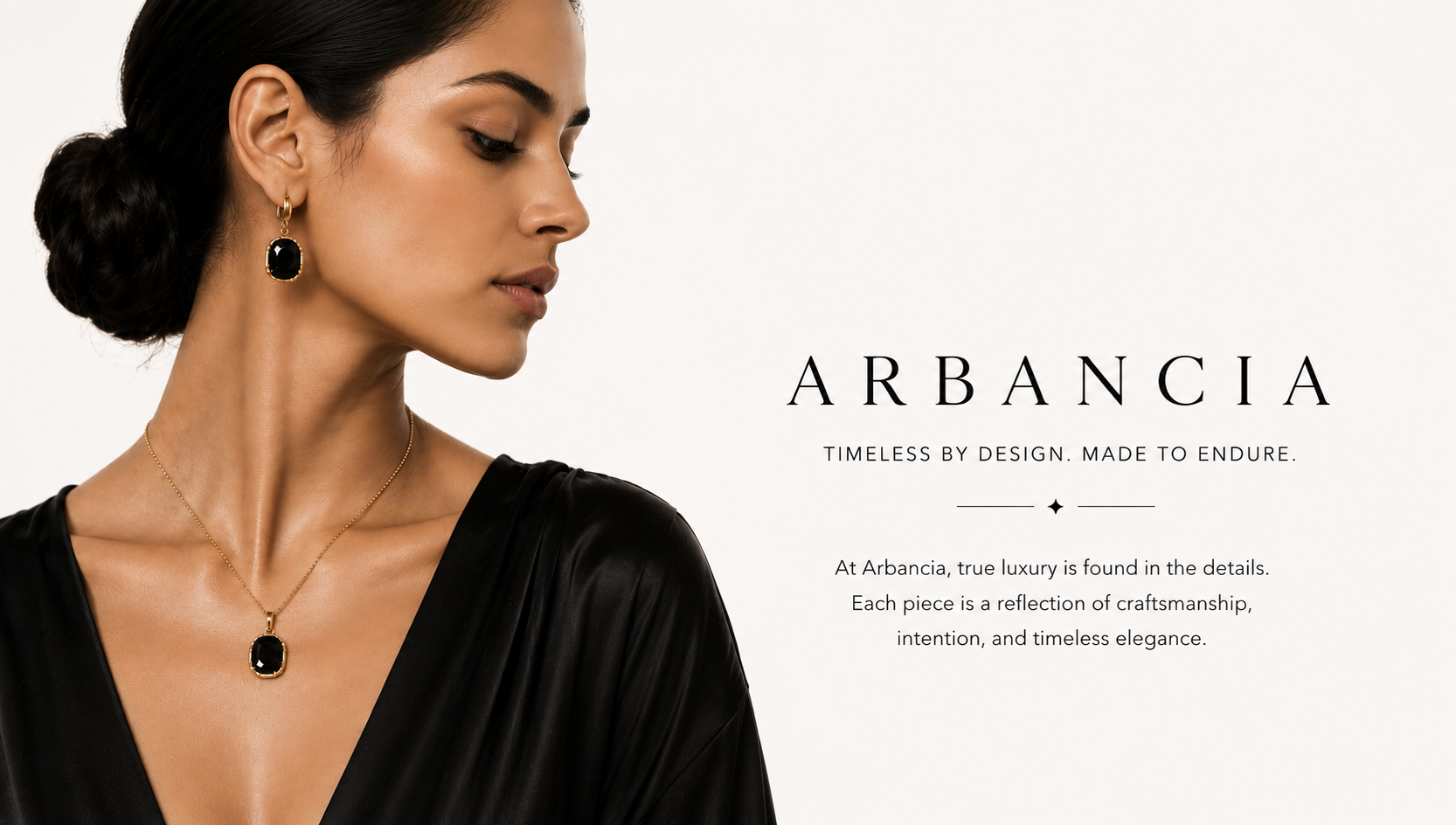 Woman wearing black jewelry with Arbancia brand text on a white background